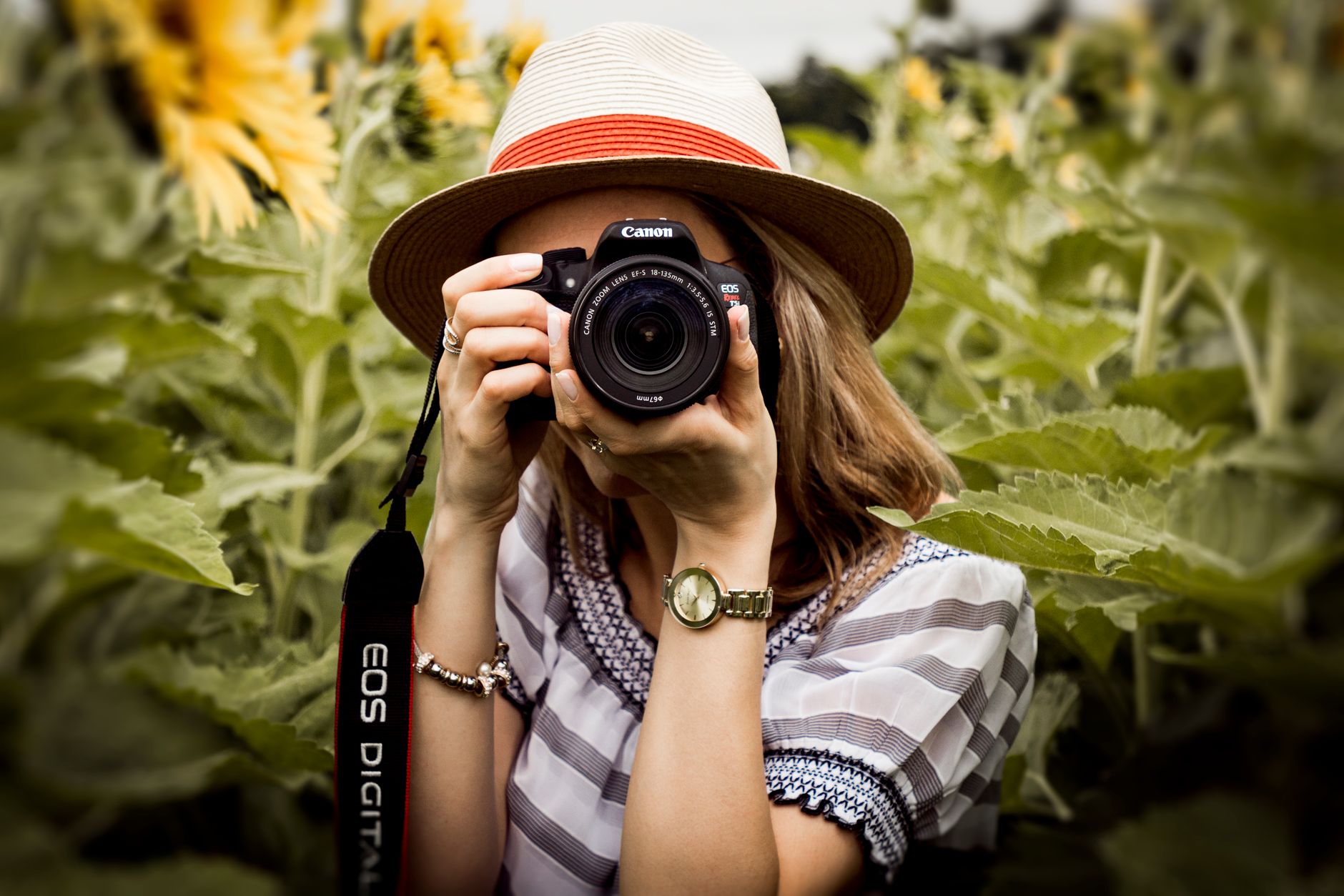 woman taking a photo with her camera